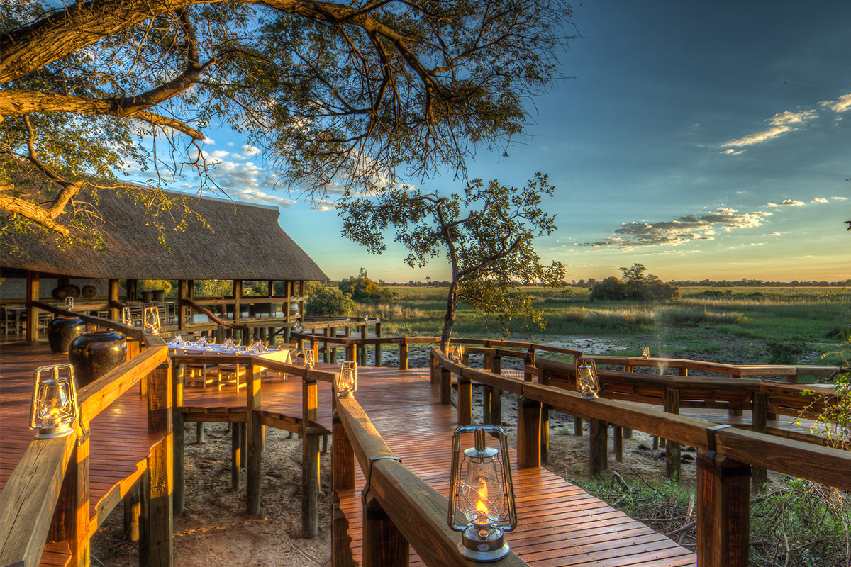 Lantern-lit deck at a camp overlooking the Okavango Delta, Botswana